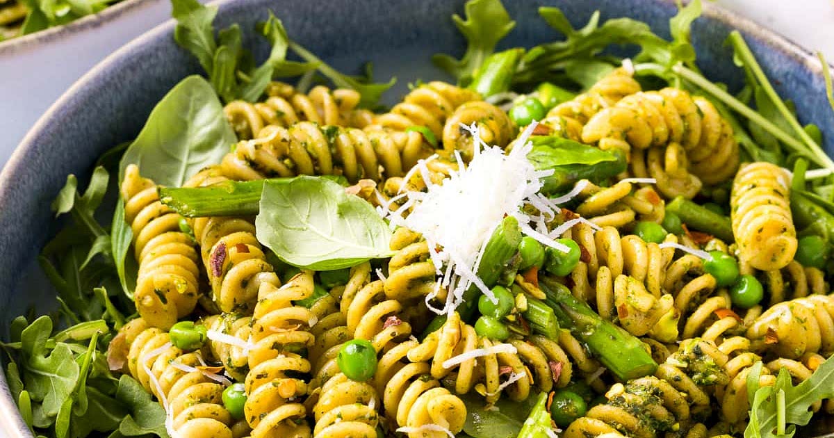 Pesto Pasta with Arugula, Asparagus, Peas, and Pistachios Recipe