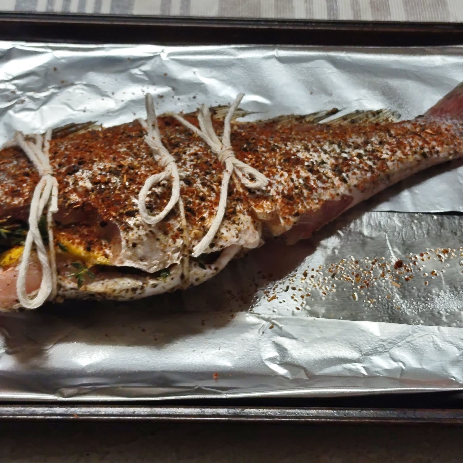 Whole Baked Fish – Herb-stuffed with Garlic & Dill Butter Sauce Recipe